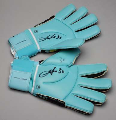 A group of four pairs of Chelsea goalkeepers' gloves