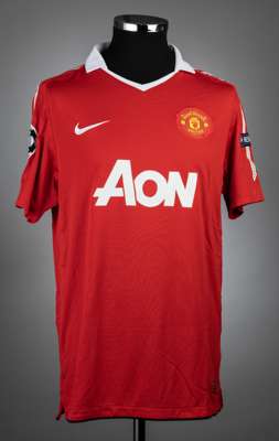 Jonny Evans red & white Manchester United UEFA Champions League no.23 jersey v Glasgow Rangers, played at Ibrox Stadium, on 24th November 2010,
 match