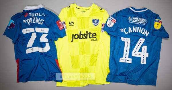 Three signed Portsmouth FC jersey's,
 comprising Andy Cannon blue and white no.14 home jersey, season 2018-19, short-sleeved with SKYBET LEAGUE ONE EF