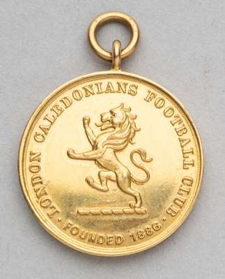 Gold medal commemorating London Caledonians FC reaching the third round of the F.A. Cup in 1927-28,
 9ct gold, inscribed obverse and reverse, weight 9