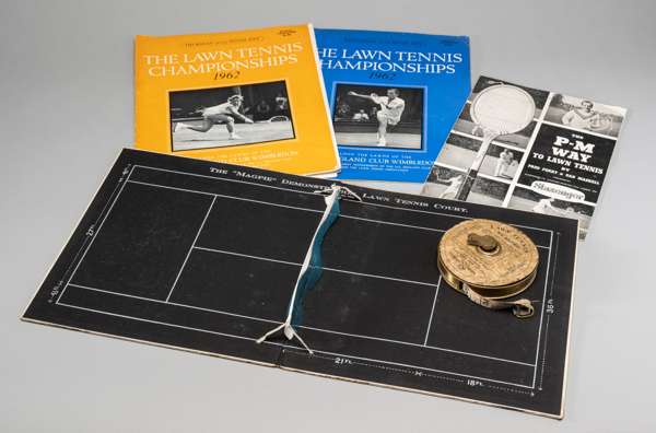 Lawn tennis memorabilia,
 comprising: an unwinding Lawn Tennis Measure, bearing a cross-arrows trademark, possibly George Bussey, the 78 feet cloth ta