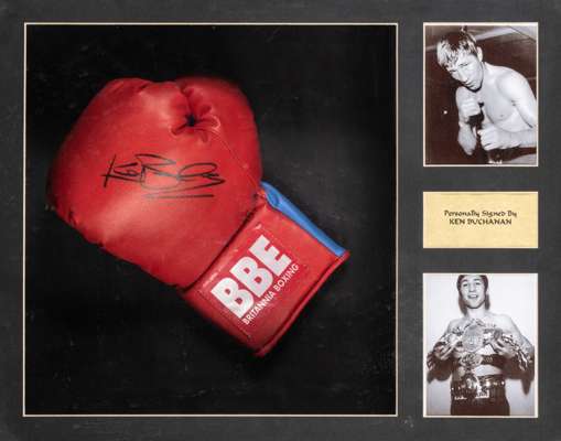 Boxing legend Ken Buchanan signed boxing glove display,
 a red left BBE Britannia Boxing signed with black marker pen mounted beside two b&w photograp