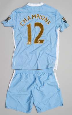 Mario Balotelli blue Manchester City "Champions 12" jersey worn at the Premier League 2011-12 trophy presentation,
 Umbro, short-sleeve with BARCLAYS 