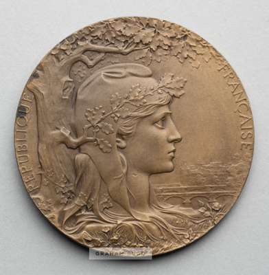 Paris 1900 Exposition Universelle Internationale award medal,
 designed by Chaplain, bronze, obverse depicts head of France with city view in the back