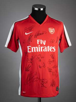Signed Arsenal replica home jersey season 2009-10,
 signatures include Theo Walcott, Denilson, Cesc Fabregas, Robin van Persie, Andrey Arshavin, Jack 