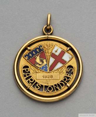 Yellow-metal and enamel London Football Association v. Diables Rouge pierced medal/badge, 1928
 the obverse 1928 PARIS LONDRES with ring suspension