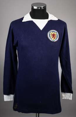 Denis Law blue No.10 Scotland International jersey, early 1970s, 
 Umbro, M, with v-neck style collar and embroidered cloth badge inscribed THE SCOTTI
