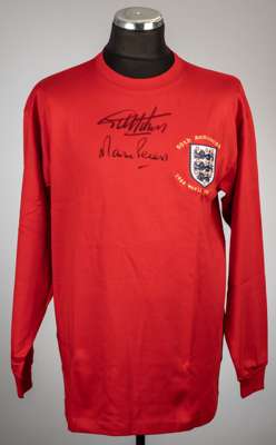 Geoff Hurst and Martin Peters signed red England 50th Anniversary 1966 World Cup winners commemorative jersey, 
 long-sleeved with national three lion