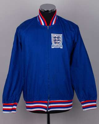 Blue, red and white England Intermediate tracksuit top and bottoms