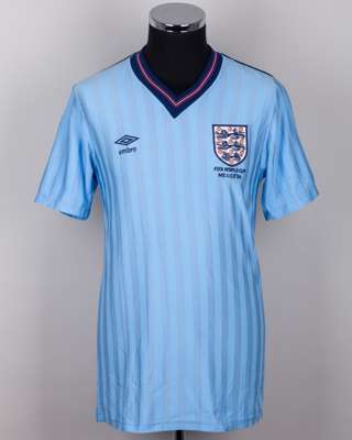 John Barnes blue No.19 England match issued short-sleeved shirt, 1986