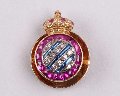 A continental yellow-metal and gem set Espanyol lapel pin