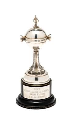 Copa Libertadores de America 1999 replica trophy,  

miniature silver-plated replica trophy inscribed LIBERTADORES DE AMERICA AMP: SUDAMERICANO DE FUT