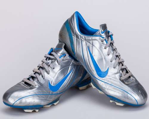 Cristiano Ronaldo a pair of silver and blue Nike worn football boots, 2004