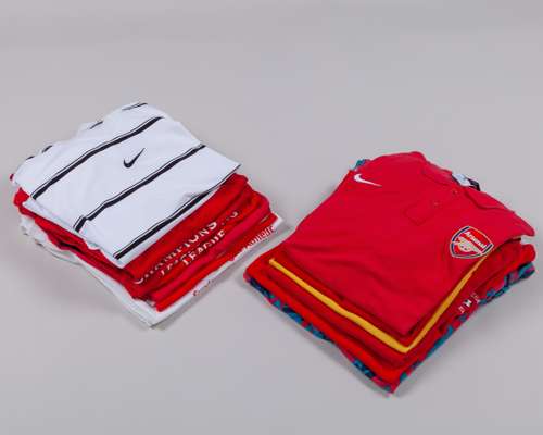 Fourteen various Arsenal tops