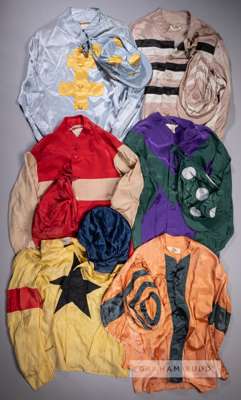 Six sets of racing colours,
 comprising a set of orange silks with green seams with sleeve hoops, with orange and hooped seamed cap, both bearing make
