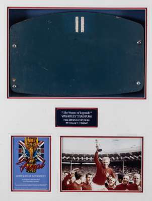 Wembley Stadium seat back no.11 display,
 the blue painted seat back with number 11, mounted in a display with a colour print of Bobby Moore holding t