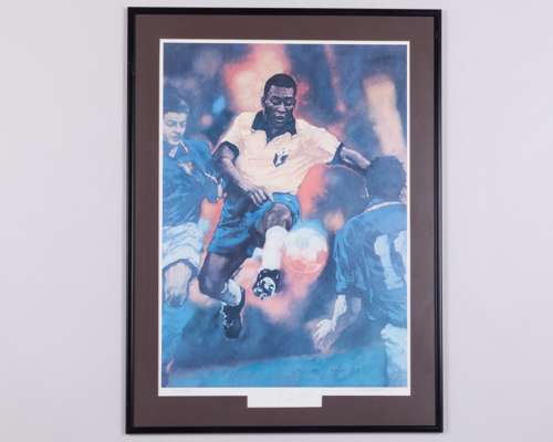 A limited edition Pele autographed print