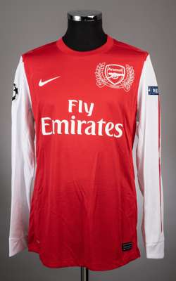 Jeramie Frimpong red Arsenal No. 26 jersey from the 2011-12 season Champions League,
 Player issued long sleeved NIKE example with the UEFA RESPECT ba