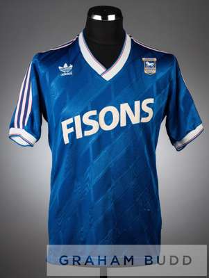 Blue and white Ipswich Town no.3 home jersey, season 1987-88,
 short-sleeved with club crest and sponsor logo, reverse numbered three