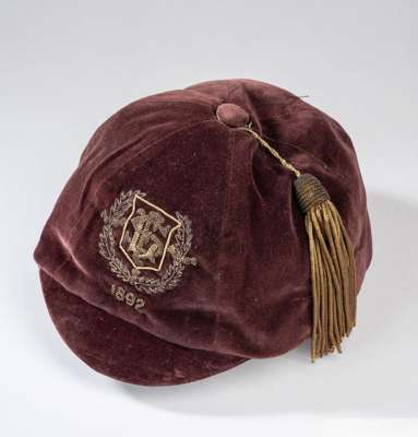 William Proudfoot's maroon Scottish League v. Scottish Alliance cap, 1892
 with gilt embroidered tassel, SFL initials and 1892

 The cap represents th