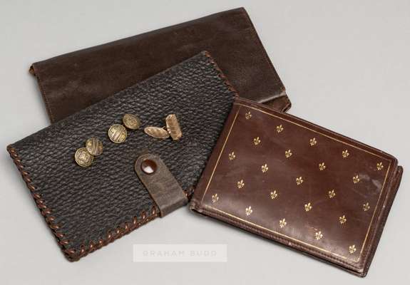 Three leather wallets originally belonging to the Manchester United and England footballer Duncan Edwards,
 one in brown leather stamped gilt Genuine 