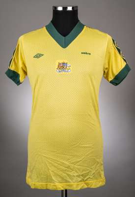 Yellow and green No.14 Umbro "Airtex" Australian International Jersey circa late 1970s,
 this is a short sleeved Umbro example in yellow with green tr