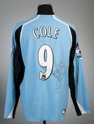 Andy Cole signed blue and black Fulham 125 Years no.9 away jersey, season 2004-05,
 Puma, long-sleeved with BARCLAYS PREMIERSHIP sleeve badges, club c