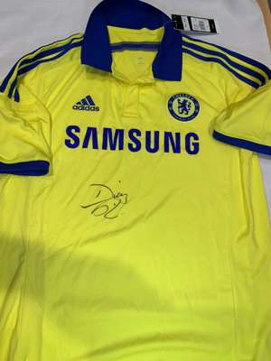 Diego Costa signed yellow Chelsea replica away jersey 2014-15,
 Adidas, short-sleeved with club crest and sponsor logo, signed in marker pen to front,