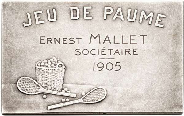 A French silver medal for Jeu de Paume, dated 1905, in the form of a silver plaquette inscribed JEU DE PAUME, ERNEST MALLET, SOCIETAIRE, 1905, decorat