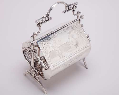 Silver-plated tennis themed biscuit tin