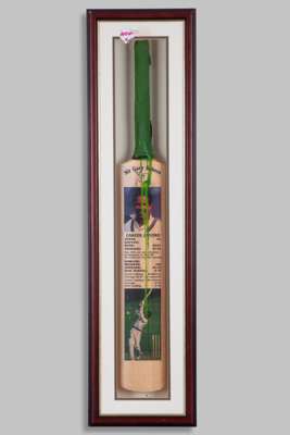 Sir Gary Sobers autographed commemorative cricket bad display