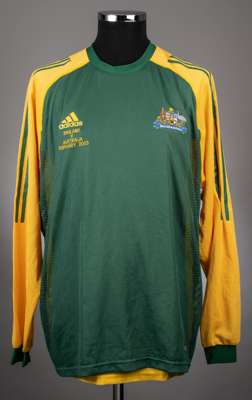 Yellow and green Australia Adidas home jersey from the game v England on 12/2/2003 that took place at West Ham United's Upton Park stadium, 
 the jers