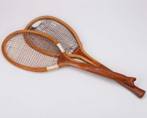 Two classic tennis rackets both with unusual handles