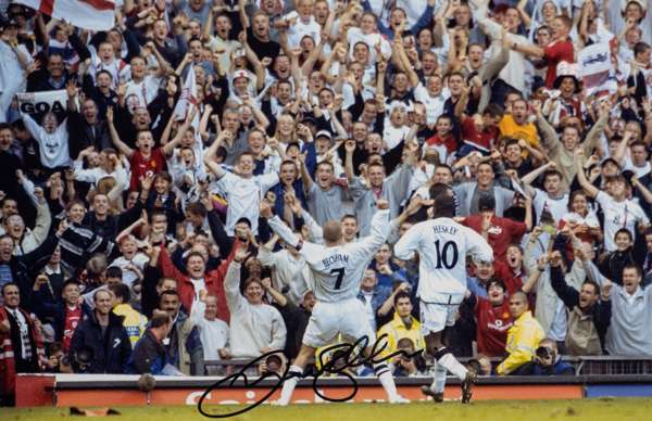 David Beckham England signed colour photograph,
 depicting the England legend celebrating his famous last minute goal v Greece in the World Cu qualifi