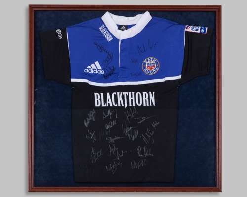 A black and blue Bath Rugby autographed shirt