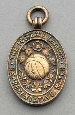 Peter Harris silver-gilt 1956 Football League Representative medal, 
 the obverse inscribed THE FOOTBALL LEAGUE REPRESENTATIVE MATCH, the reverse insc