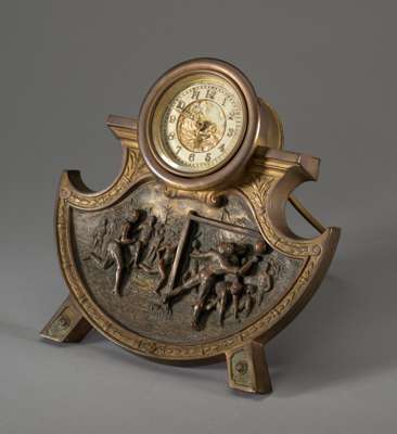 Victorian brass football clock, circa 1890,
 patented in Great Britain and France by the British United Clock Company, Birmingham, the body beneath th