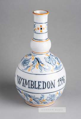A GIROBANK limited edition water or condiment Wimbledon 1996 jug,
 the jug is hand-decorated in blue and orange, one side shows a girls playing tennis