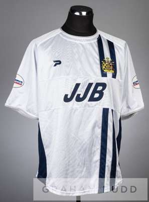 Two Wigan Athletic player jerseys,
 the first a Scott Green signed white and navy Wigan Athletic no.14 away jersey, season 2002-03,
 short-sleeved wit