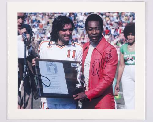Pele autographed George Best handing Pele greatest player award colour photograph print