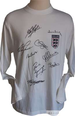 England retro home shirt signed by nine of England'sgreatest players