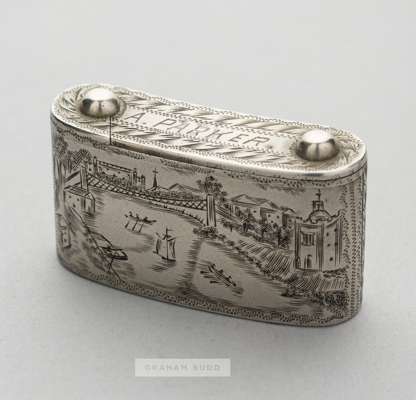 Football themed trick opening vesta case, 1900s,
 the white metal squat rectangular vesta case with engraved images of a river cityscape, the obverse 