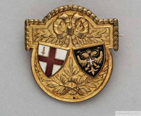 Yellow-metal and enamel London Football Association International match badge
 the obverse decorated with enamel shields and laurel wreaths with brooc