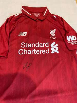 Sadio Mane signed red Liverpool replica home jersey 2018-19,
 New Balance, short-sleeved with club crest and sponsor logo, signed in marker pen on fro