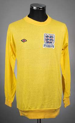 A yellow Airtex England Intermediate goalkeeper jersey, No.1, 
 with crew-neck collar and embroidered three lion badge inscribed Intermediate, Umbro l