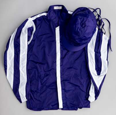 Derrick Smith racing silks, 
 bearing Josephine O'Brien neck label, purple jacket with white seams, striped sleeves and purple cap

 Winners too numer