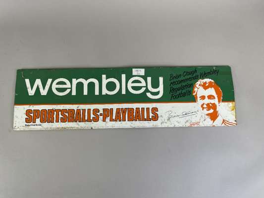 A Sportsballs-Playballs advertising tin sign featuring Brian Clough, double-sided, size..

 Areas of rust, bent and misshapen