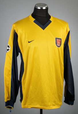 Thierry Henry yellow and navy Arsenal UEFA Champions League no.14 away jersey, season 2000-01,
 Nike, long-sleeved with UEFA STARBALL sleeve badge, cl