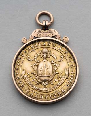Football League Division 1 Championship medal awarded to a Sunderland player in season 1901-02,
 inscribed with competition details, reverse with the 