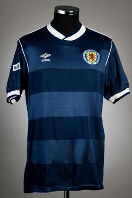 Blue Scotland no.14 home jersey, circa 1986,
 Umbro, short-sleeved with dark and mid blue hooped, white collar and cuffs, embroidered national emblem 